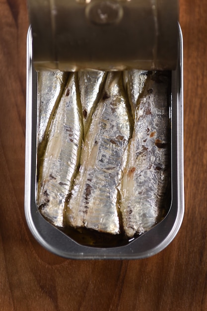 Canned sardine on wooden table