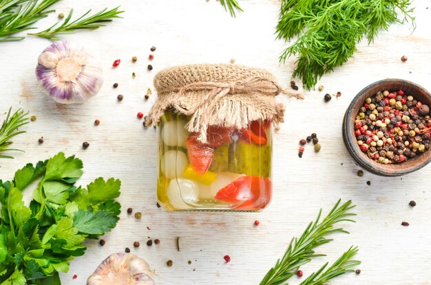 Canned vegetables in a glass jar. Food stocks. Top view.