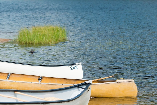 canoe on blue ake shore