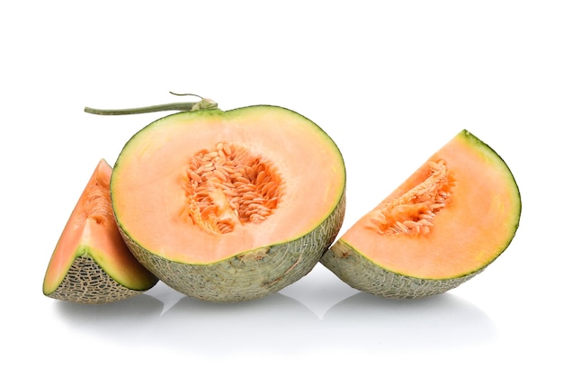 Cantaloupe, half watermelon and one slice split on white background.