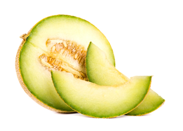 Photo cantaloupe melon isolated on white space. juicy and sweet cantaloupe melon isolated on white space.