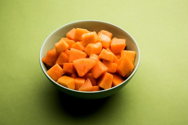 Cantaloupe or muskmelon or kharbuja cut into pieces, served in a bowl. selective focus