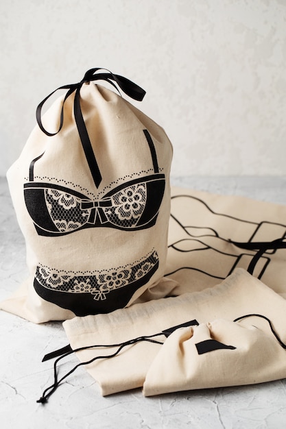 Canvas bag with drawstring, mockup of small eco sack made from natural cotton fabric cloth