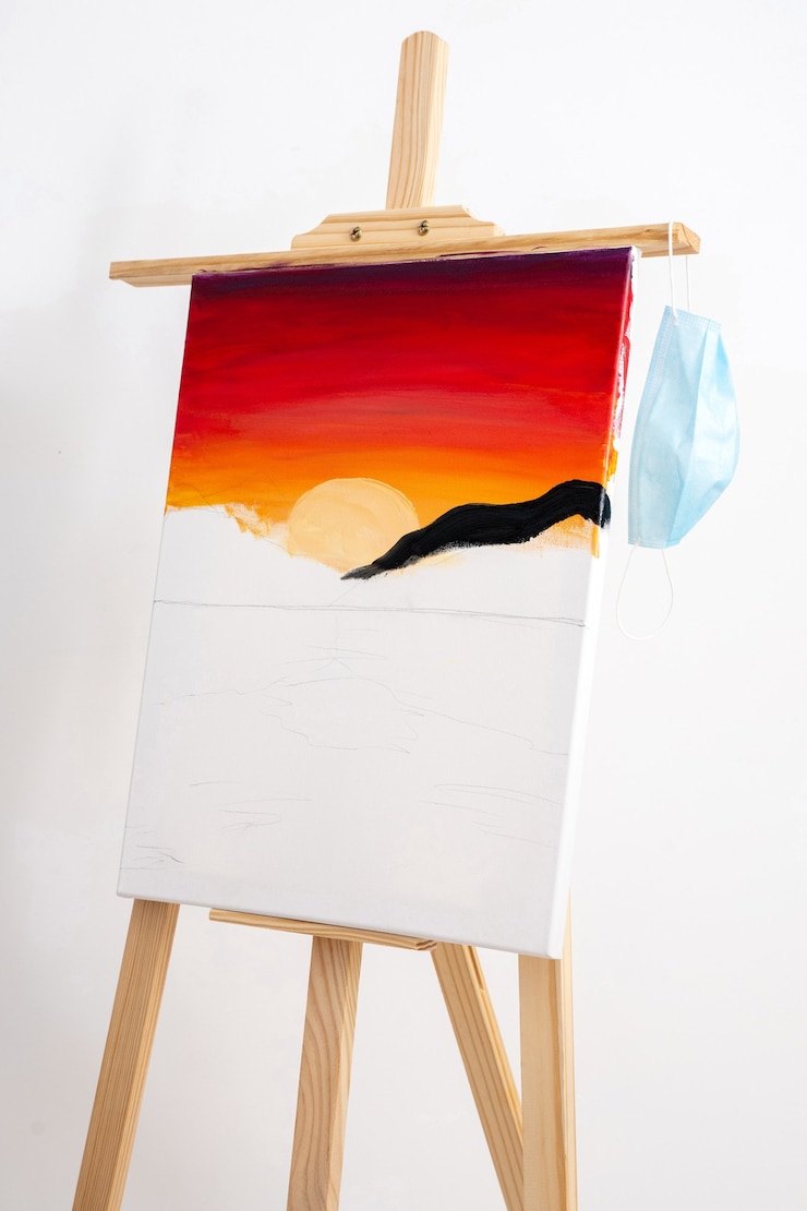 Photo canvas on easel on white background