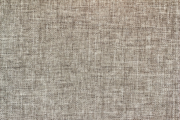 A canvas of gray cotton fabric.Background, textile texture.