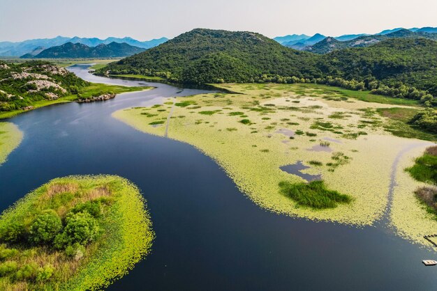 Canyon of Rijeka Crnojevica river near the Skadar lake coast One of the most famous views of Montenegro River makes a turn between the mountains Karuc willage