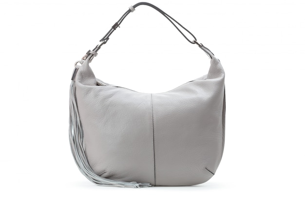 白い背景の上の容量性の女性財布ハンドバッグ