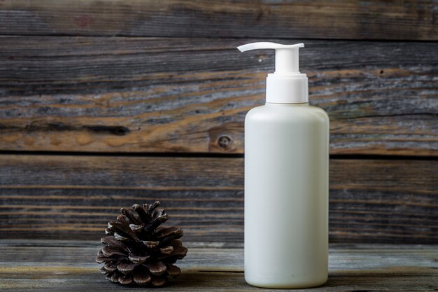 capacity for cosmetic, wooden background
