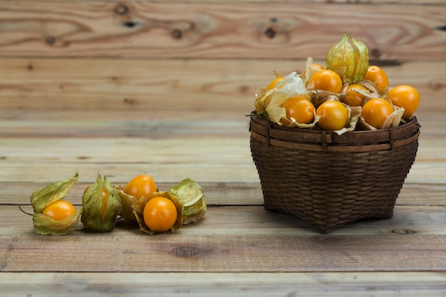 Cape gooseberry on wooden background