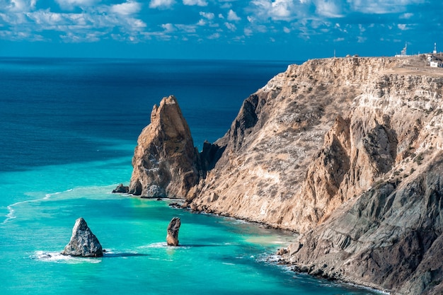 Cape in the sea with azure water