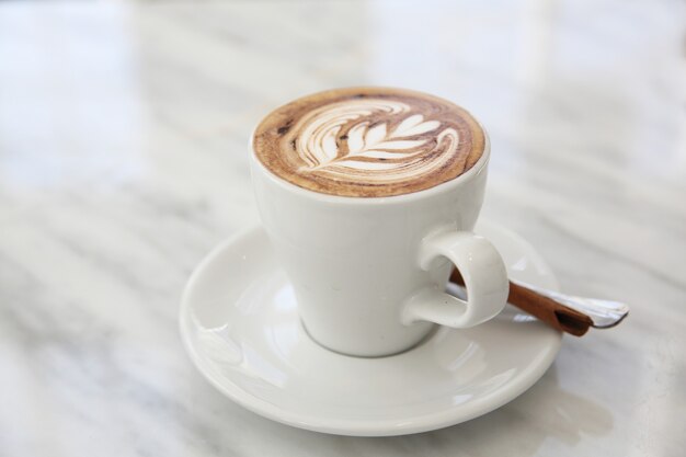 Cappuccino coffee in white table