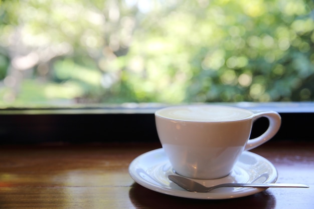 Cappuccino koffie op hout achtergrond