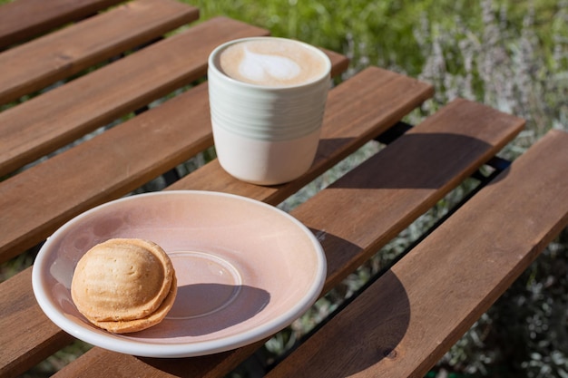 Cappuccino with nut dessert with condensed milk