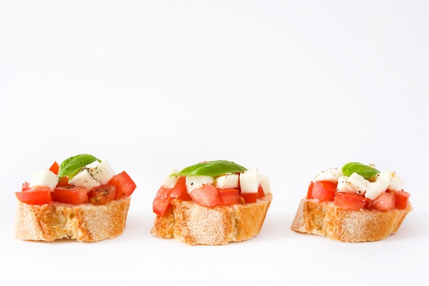 Caprese salad bruschettas isolated 