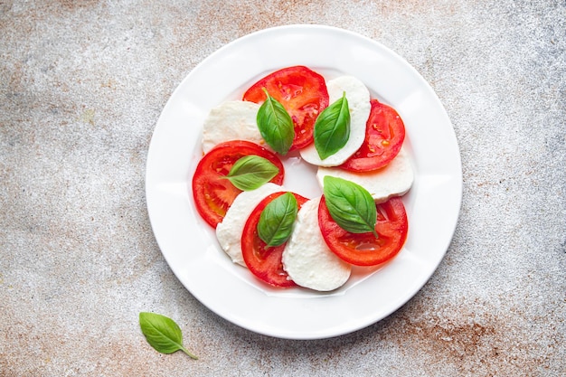 caprese salad mozzarella and basil tomato fresh meal food snack on the table copy space food