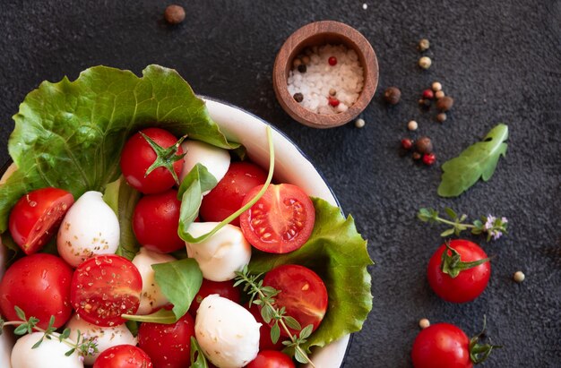 Caprese salad with mozzarella cheese and tomatoes of italy cuisine