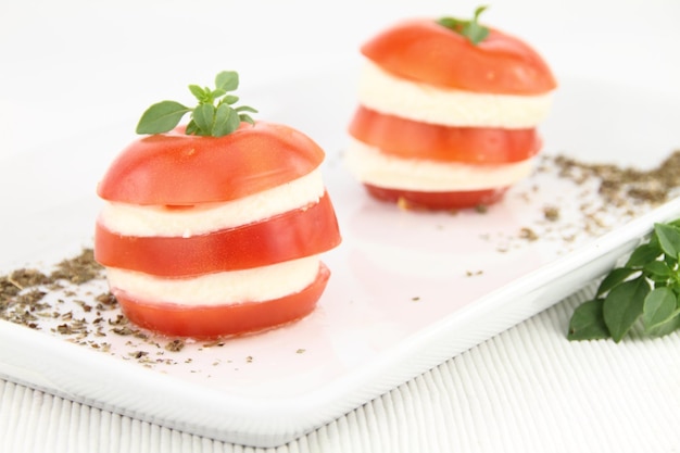 Caprese salad with tomatoes mozzarella and basil