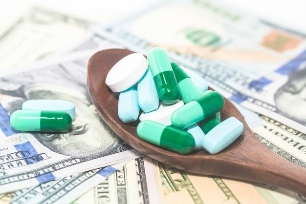 Capsule pill medicine and dollar together health care health insurance concept ideas