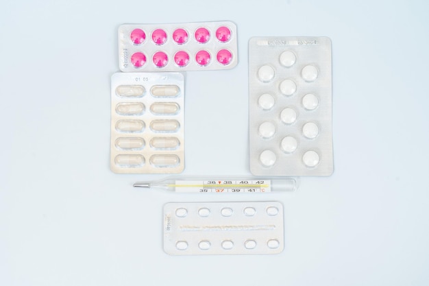 Capsules pills and tablets in blister packaging Isolated