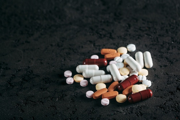 a capsules tablets on wood