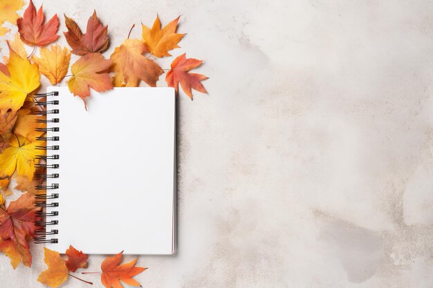 Captivating autumn vignette notebook amidst fallen leaves aerial perspective