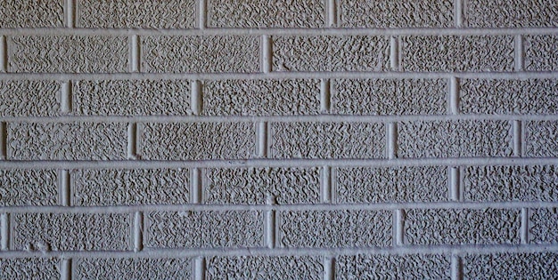 Foto una foto accattivante di un antico muro di mattoni texturati