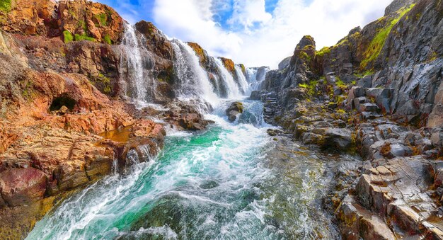 Captivating view of kolufossar waterfall at summer sunny day