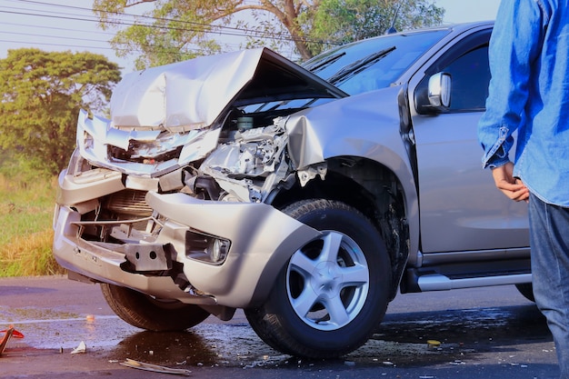 Photo car accident front of car get damaged by accident on the road