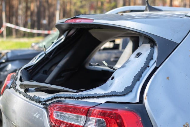 A car after an accident with a broken rear window Broken window in a vehicle The wreckage