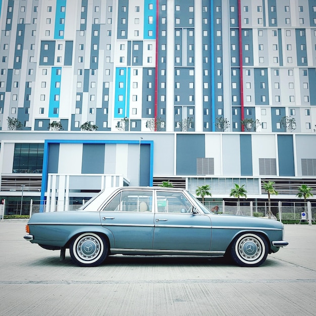 car against building on street