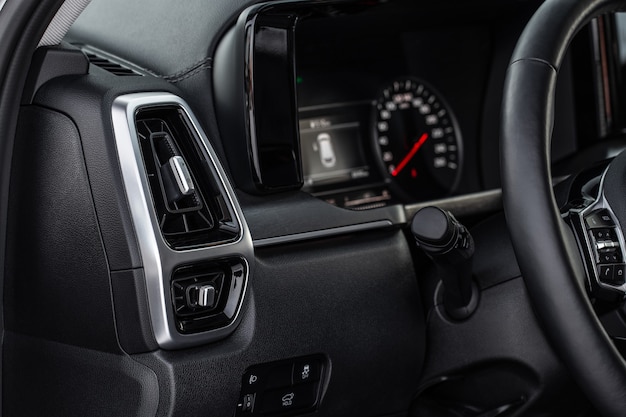 Car air conditioning close up view. The air conditioner flow inside the car. Detail interior of car. Air ducts.