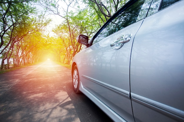 A Car on asphalt road in summer