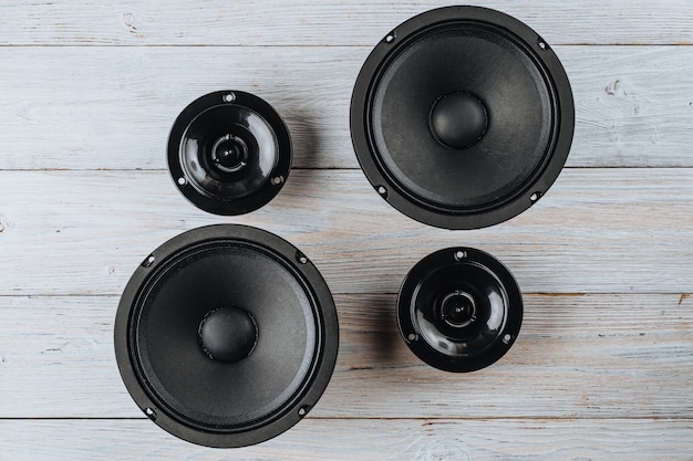 Car audio car speakers on a white wooden background