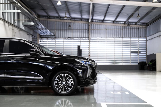 Car in automobile repair service center with softfocus and over light in the background