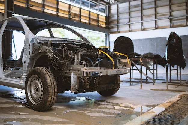 Car in automobile repair service center