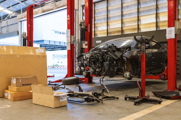 Car in automobile repair service center