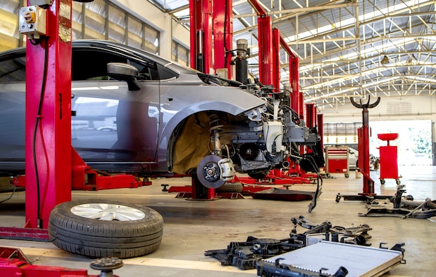 Car in automobile repair service center