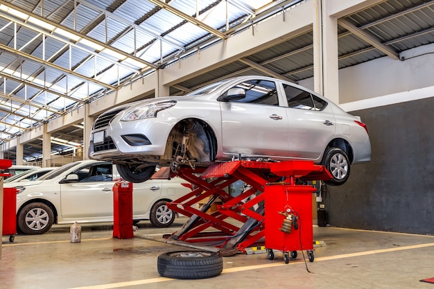 Car in automobile repair service center