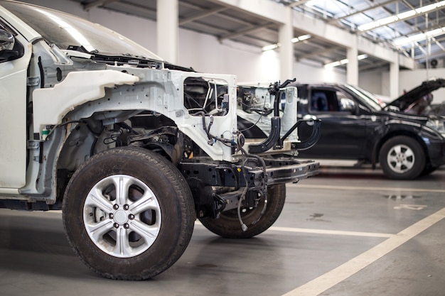 Car in automobile repair service center