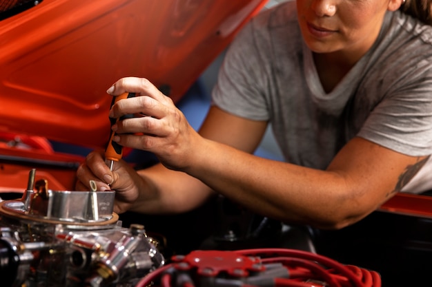 Car being taking care of in workshop