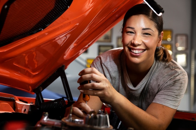 Car being taking care of in workshop