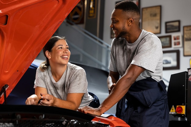 Car being taking care of in workshop