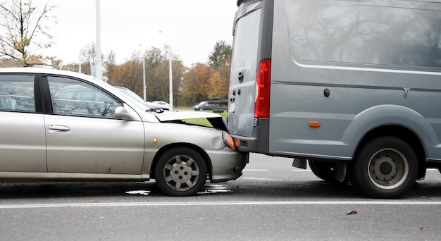 Car crushed hood bumping into truck dangerous