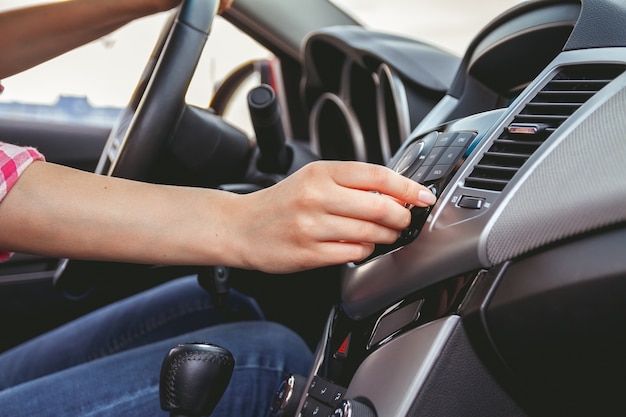 Car dashboard. Radio closeup