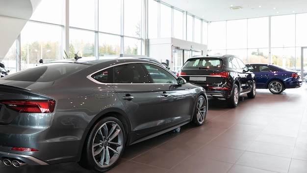 car dealership interior Premium cars lined up.