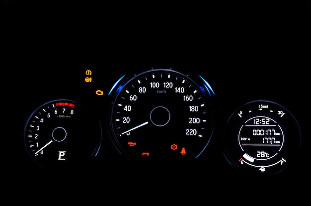Car digital dashboard display warning lamps illuminated show\
all signs during system check on engine start.