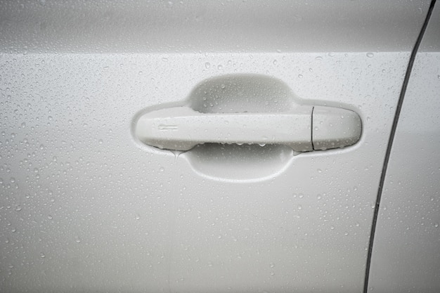 Car door handle with water drops