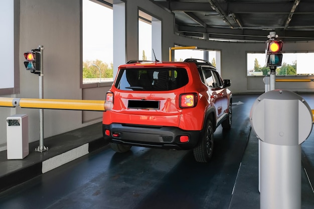 The car drives into an underground parking lot