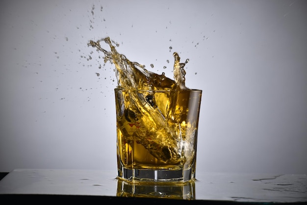 Car Drown in Alcohol Glass, Drink and Drive Concept