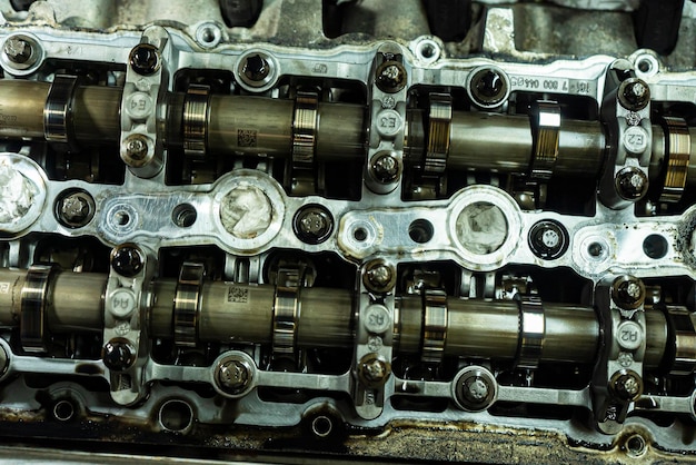 Car engine camshafts disassembled for maintenance 4